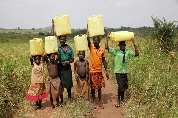 Ugandan children fetching water, Masindi, Uganda, Africa