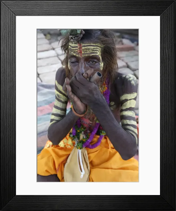 Framed Print : Indian sadhu smoking a chilum in Vrindavan, Uttar Pradesh, India, Asia Framed Print : Indian sadhu smoking a chilum in Vrindavan, Uttar Pradesh, India, Asia
