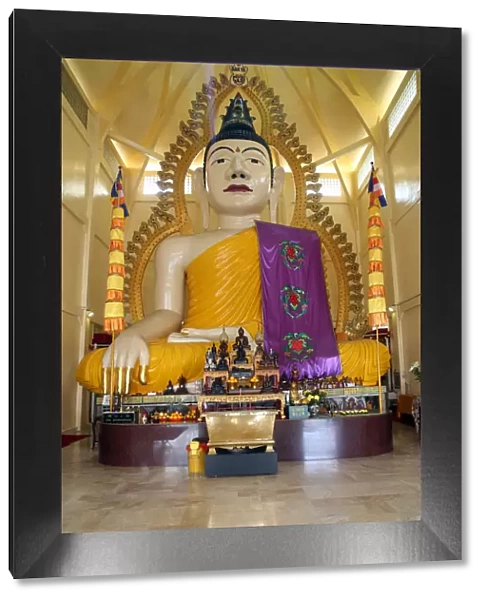 Tall statue of a seated Shakyamuni Buddha, Sakyamuni Buddha Gaya temple, Singapore