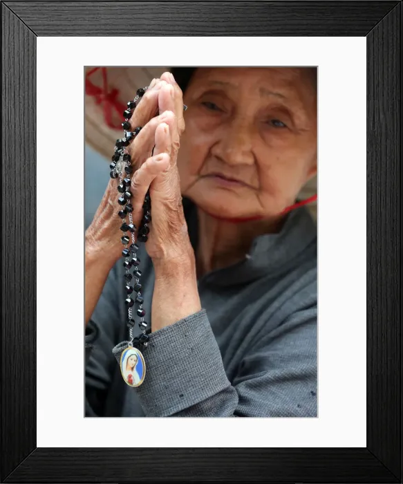 Framed Print : Old Vietnamese woman praying with prayer beads, St. Philip Church (Huyen Sy Church) Framed Print : Old Vietnamese woman praying with prayer beads, St. Philip Church (Huyen Sy Church)