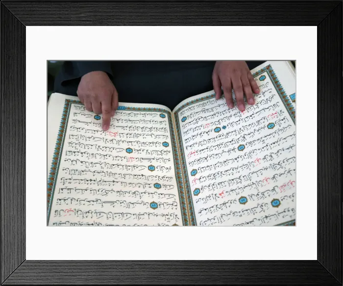 Framed Print : Imam reading the Quran in a mosque, Seine-e-Marne, France, Europe Framed Print : Imam reading the Quran in a mosque, Seine-e-Marne, France, Europe