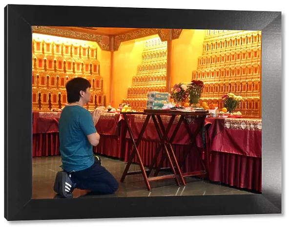 Ceremony in Ancenstral Hall, Buddha Tooth Relic Temple in Chinatown, Singapore