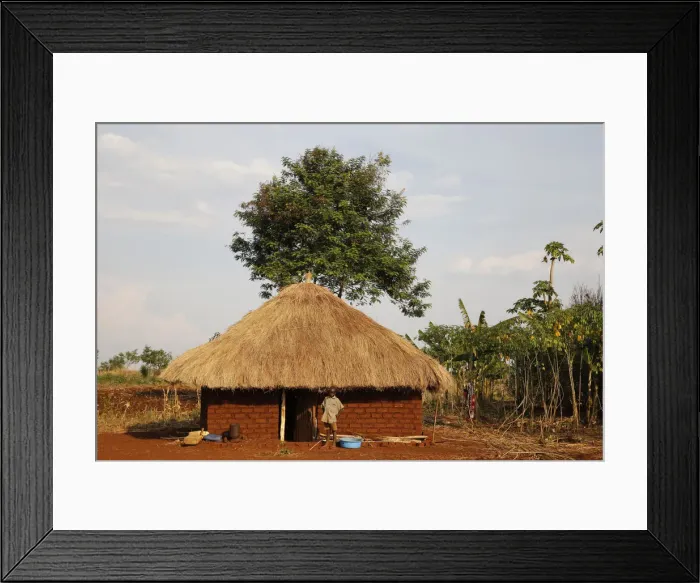 Framed Print : Ugandan child outside his home, Bweyale, Uganda, Africa Framed Print : Ugandan child outside his home, Bweyale, Uganda, Africa