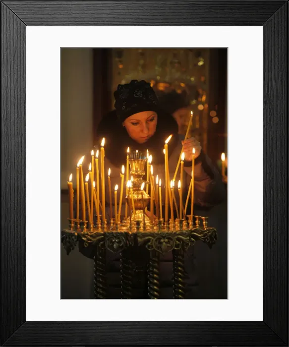 Framed Print : Woman lighting a candle, Trinity Cathedral, St. Petersburg, Russia, Europe Framed Print : Woman lighting a candle, Trinity Cathedral, St. Petersburg, Russia, Europe