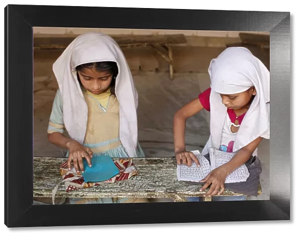 Girls learning Arabic in a medersa (koranic school), Fatehpur Sikri, Uttar Pradesh, India