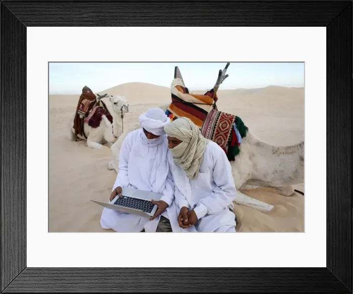 Framed Print : Bedouins using a laptop in the Sahara, Douz, Kebili, Tunisia, North Africa, Africa
