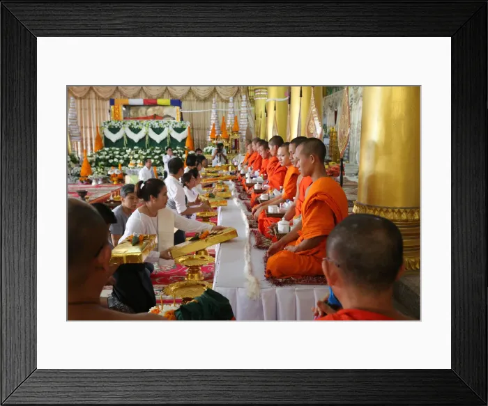 Framed Print : Seated Buddhist monks chanting and reading prayers at a ceremony Framed Print : Seated Buddhist monks chanting and reading prayers at a ceremony