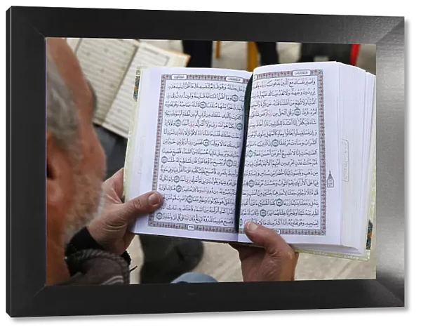 Palestinians reading the Koran outside Al-Aqsa mosque, Jerusalem, Israel, Middle East