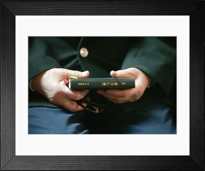 Framed Print : Hands holding Bible, Immaculate Conception Cathedral, Beijing, China, Asia Framed Print : Hands holding Bible, Immaculate Conception Cathedral, Beijing, China, Asia