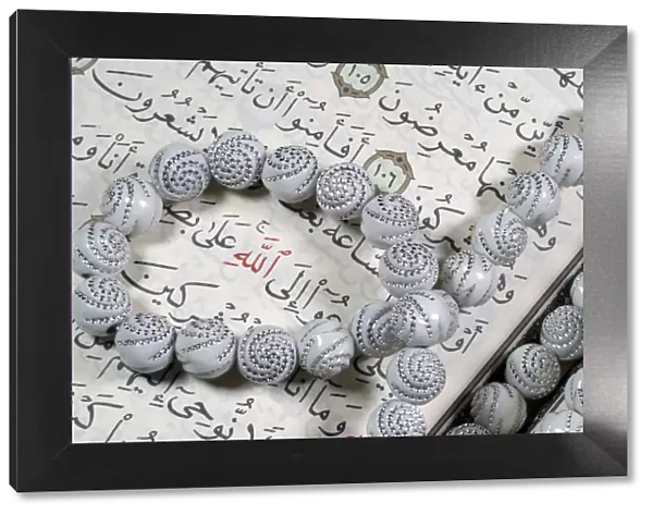 Quran and Tasbih (prayer beads), with Allah monogram in red, Haute-Savoie, France, Europe