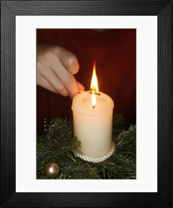 Framed Print : Lighting an Advent candle Framed Print : Lighting an Advent candle