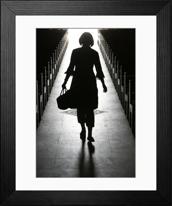 Framed Print : Silhouette of a woman in church