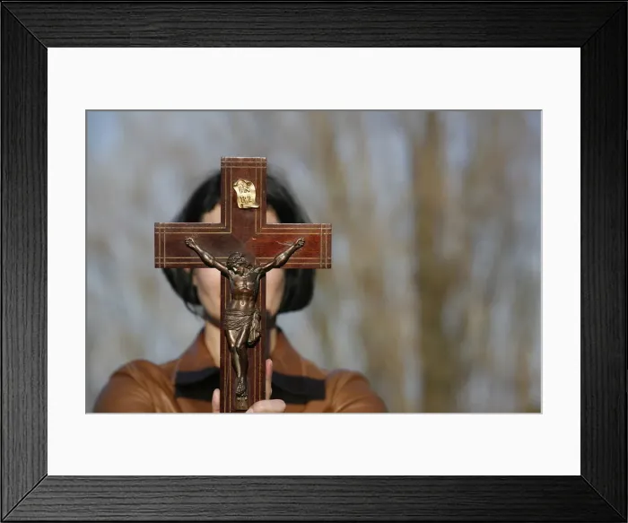 Framed Print : Woman holding forth a crucifix, Isere, France, Europe Framed Print : Woman holding forth a crucifix, Isere, France, Europe