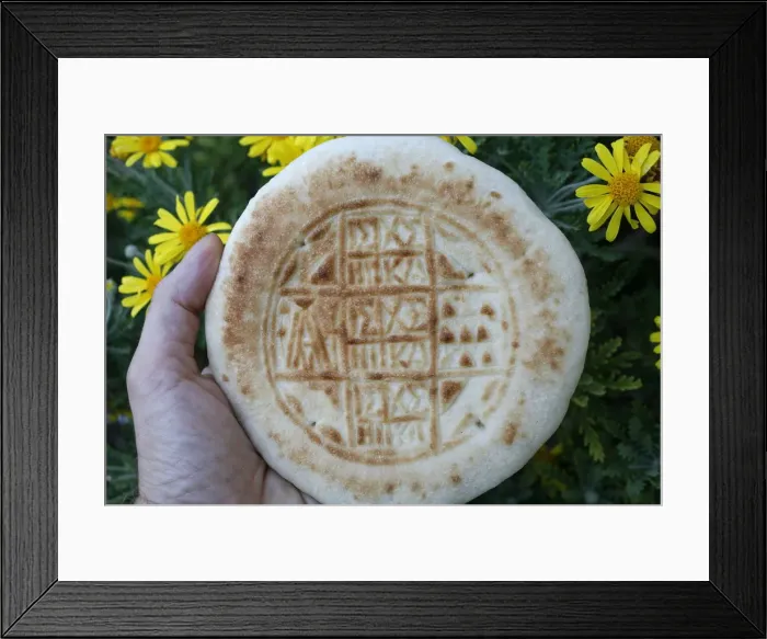 Framed Print : Close-up of a loaf of Holy bread Framed Print : Close-up of a loaf of Holy bread