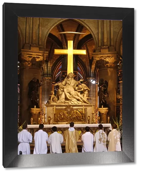 Eucharist adoration in Notre Dame de Paris cathedral, Paris, France, Europe