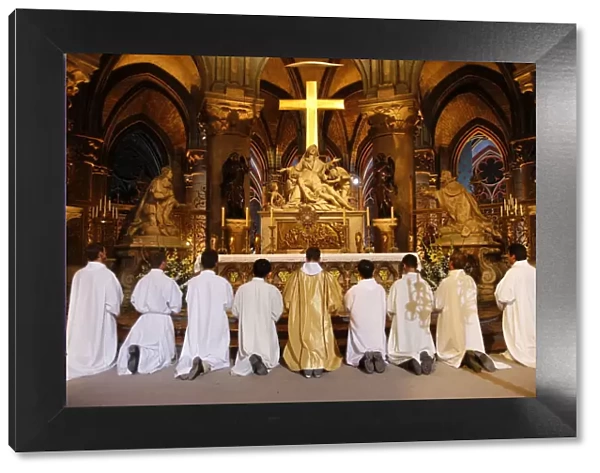 Eucharist adoration in Notre Dame de Paris cathedral, Paris, France, Europe
