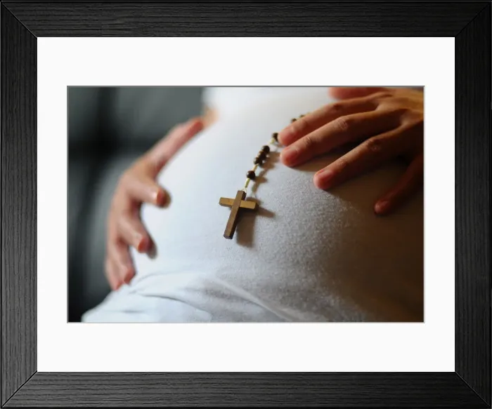 Framed Print : Pregnant woman with prayer beads, Paris, France, Europe Framed Print : Pregnant woman with prayer beads, Paris, France, Europe