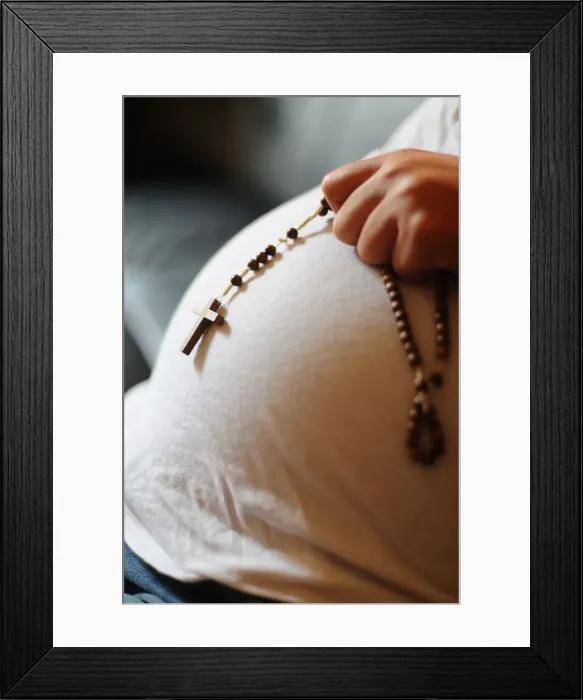 Framed Print : Pregnant woman with prayer beads, Paris, France, Europe Framed Print : Pregnant woman with prayer beads, Paris, France, Europe