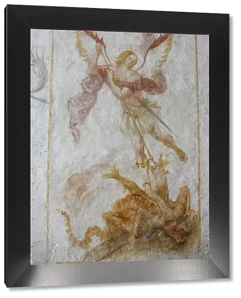 A 15th century fresco depicting St. Michael slaying a dragon, La Ferte Loupiere, Yonne