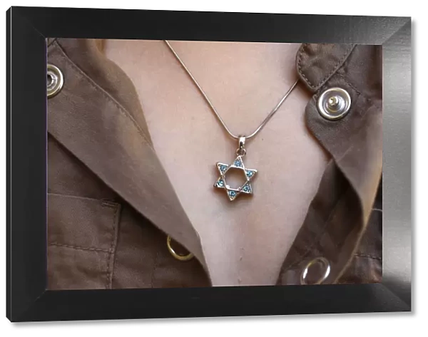 A 10-year-old girl wearing Star of David jewelry, Hertzliya, Israel, Middle East
