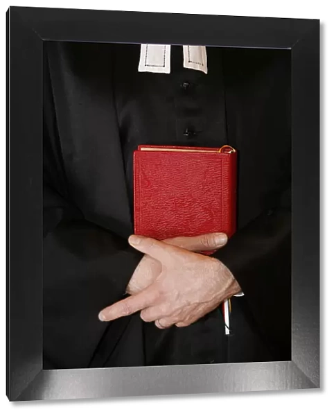 Protestant minister holding Bible, Paris, Ile de France, France, Europe