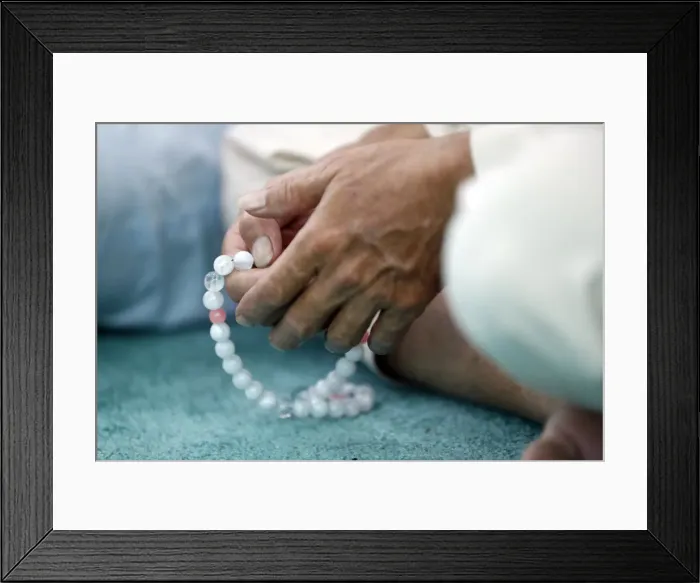 Framed Print : Close-up of man praying in a mosque with Tasbih (prayer beads), Masjid Al Rahim Mosque Framed Print : Close-up of man praying in a mosque with Tasbih (prayer beads), Masjid Al Rahim Mosque