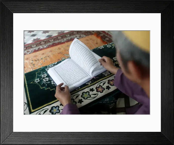 Framed Print : Muslim man reading an Arabic Holy Quran (Koran), Saigon Central Mosque, Ho Chi Minh City Framed Print : Muslim man reading an Arabic Holy Quran (Koran), Saigon Central Mosque, Ho Chi Minh City