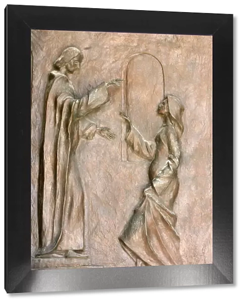 Sculpture depicting the Visitation with Mary and Elizabeth on the door of the
