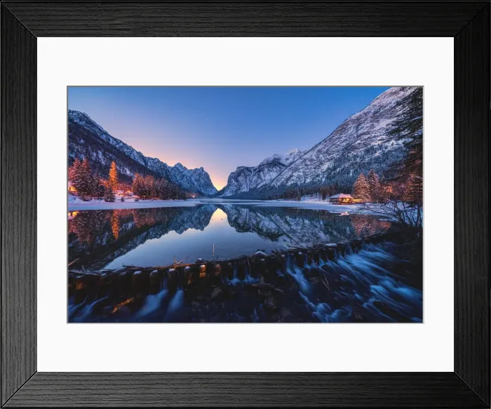 Framed Print : Dusk lights on the snowy peaks mirrored in Lake Dobbiaco, Val Pusteria, Dolomites Framed Print : Dusk lights on the snowy peaks mirrored in Lake Dobbiaco, Val Pusteria, Dolomites