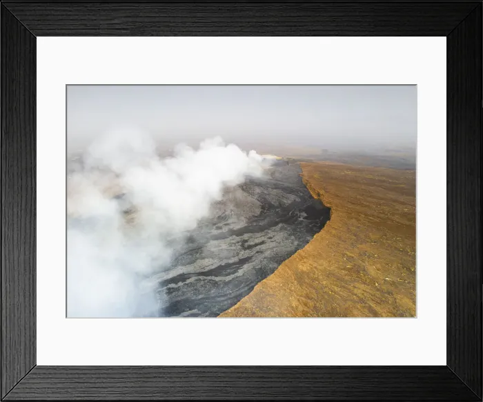 Framed Print : Arid soil on edge of the smoky Erta Ale volcano from above, Danakil Depression Framed Print : Arid soil on edge of the smoky Erta Ale volcano from above, Danakil Depression