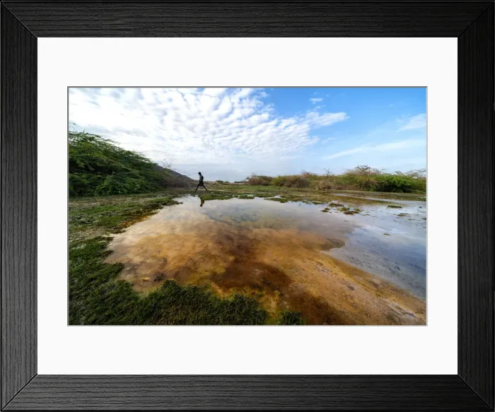 Framed Print : Afar man walking close to a geyser, Semera, Afar Region, Ethiopia, Africa Framed Print : Afar man walking close to a geyser, Semera, Afar Region, Ethiopia, Africa