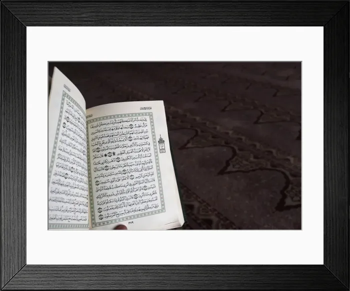 Framed Print : Close up on hand with open Quran, Putra Mosque (Masjid Putra), Putrajaya, Malaysia Framed Print : Close up on hand with open Quran, Putra Mosque (Masjid Putra), Putrajaya, Malaysia