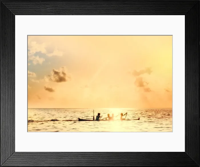 Framed Print : Local boys on a wooden canoe at sunset, Banda, Maluku, Spice Islands, Indonesia Framed Print : Local boys on a wooden canoe at sunset, Banda, Maluku, Spice Islands, Indonesia