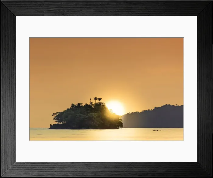Framed Print : The sun setting behind islets in the Banda archipelago, Banda, Maluku, Spice Islands