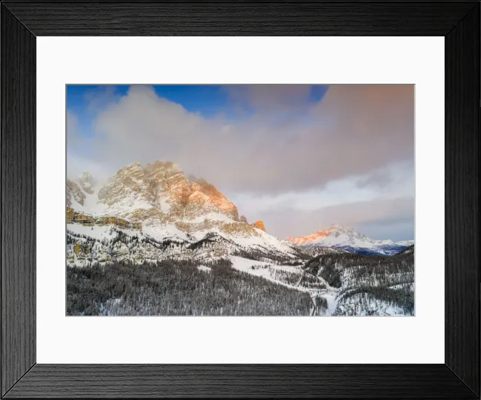 Framed Print : Sunrise over Monte Cristallo and Passo Tre Croci surrounded by snowy woods, Dolomites Framed Print : Sunrise over Monte Cristallo and Passo Tre Croci surrounded by snowy woods, Dolomites