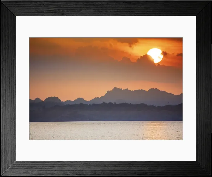 Framed Print : Sunset over limestone karst islands, Raja Ampat, West Papua, Spice Islands, Indonesia Framed Print : Sunset over limestone karst islands, Raja Ampat, West Papua, Spice Islands, Indonesia