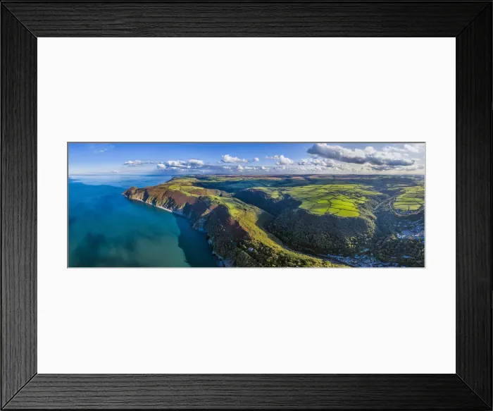 Framed Print : Aerial view over Exmoor National Park coastline, Lynton and Lynmouth, North Devon Framed Print : Aerial view over Exmoor National Park coastline, Lynton and Lynmouth, North Devon