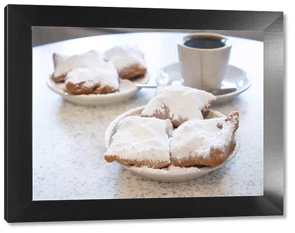 Famous food of New Orleans: beignets and chicory coffee at Cafe Du Monde, New Orleans