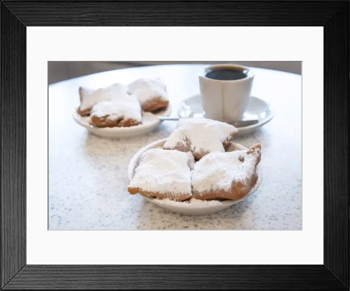 Framed Print : Famous food of New Orleans: beignets and chicory coffee at Cafe Du Monde, New Orleans Framed Print : Famous food of New Orleans: beignets and chicory coffee at Cafe Du Monde, New Orleans
