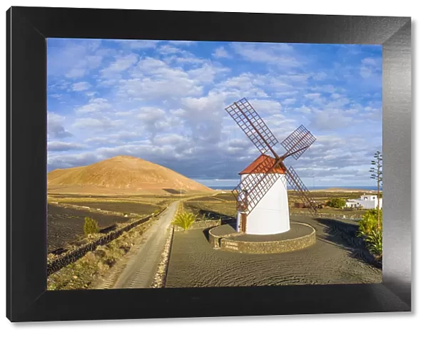 Traditional windmill and volcanic landscape, Tiagua, Lanzarote, Canary Islands, Spain