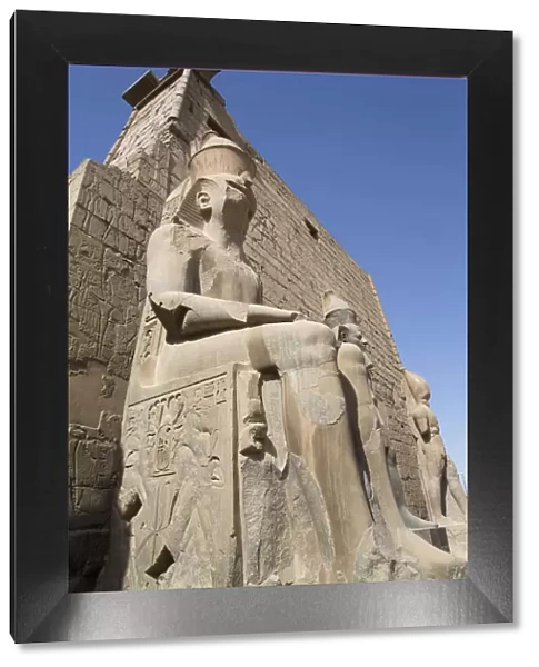 Colossus of Ramses II in front of Pylon, Luxor Temple, UNESCO World Heritage Site, Luxor