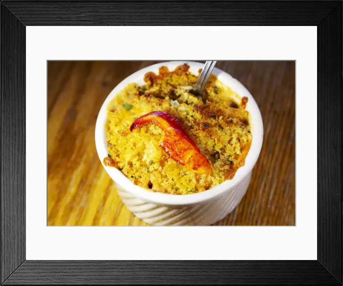 Framed Print : A bowl of lobster mac n cheese, a dish made with locally landed seafood Framed Print : A bowl of lobster mac n cheese, a dish made with locally landed seafood