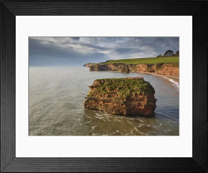 Framed Print : Red sandstone cliffs and rocks at Ladram Bay, in the Jurassic Coast UNESCO World Heritage