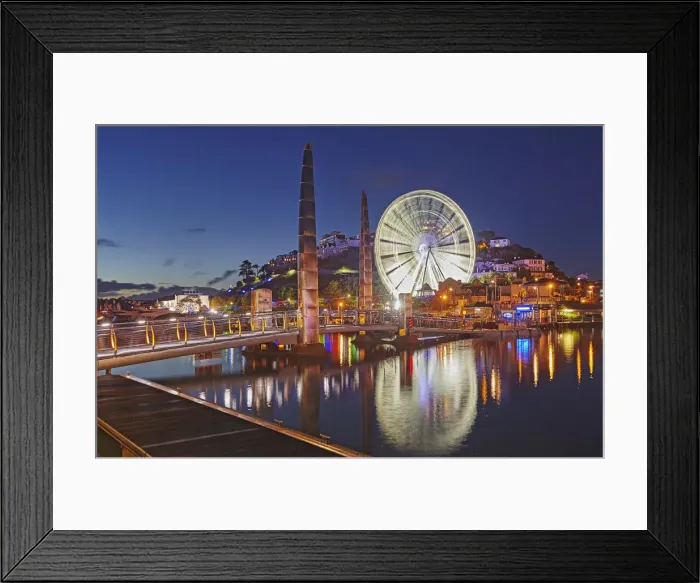 Framed Print : An atmospheric dusk view across Torquay Marina to the town of Torquay Framed Print : An atmospheric dusk view across Torquay Marina to the town of Torquay