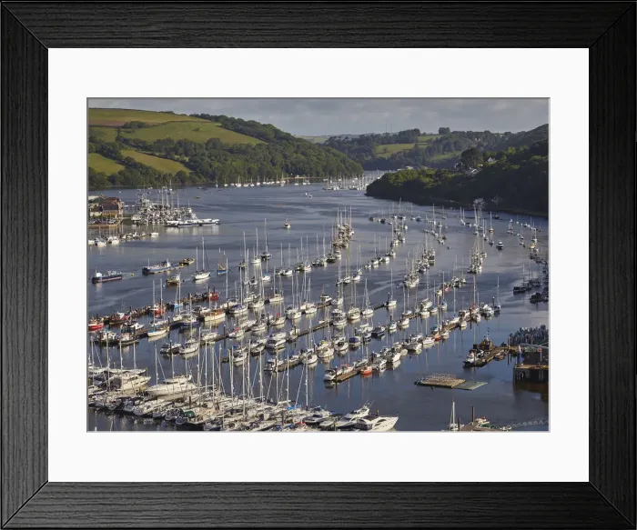 Framed Print : A magnificent view along the estuary of the River Dart, looking inland from the village Framed Print : A magnificent view along the estuary of the River Dart, looking inland from the village