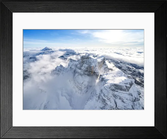 Framed Print : Snow capped Monte Pelmo emerging from clouds, aerial view, Dolomites, Belluno province Framed Print : Snow capped Monte Pelmo emerging from clouds, aerial view, Dolomites, Belluno province