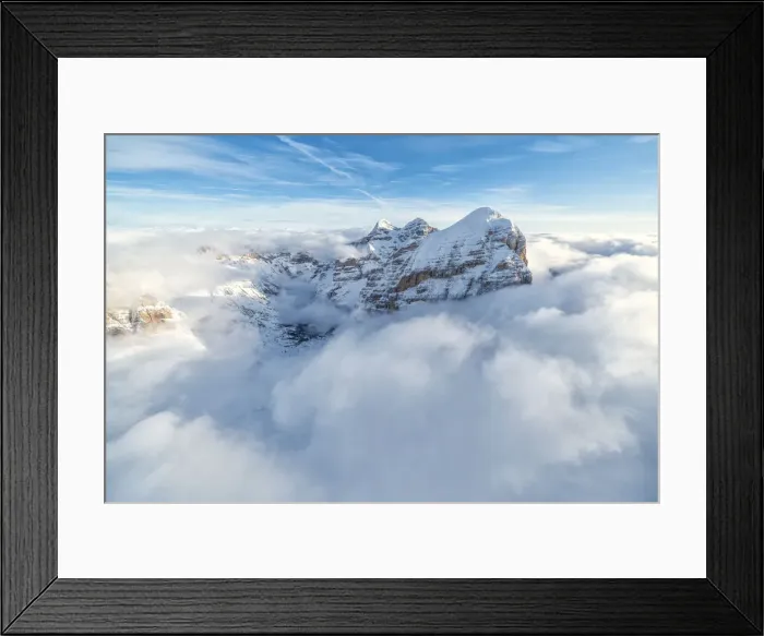 Framed Print : Aerial view of the snow capped Tofane group in a sea of clouds, Dolomites Framed Print : Aerial view of the snow capped Tofane group in a sea of clouds, Dolomites