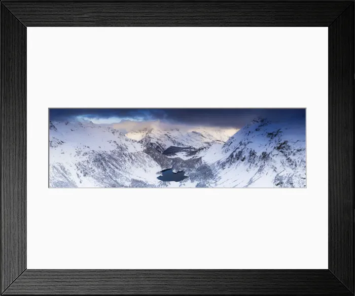 Framed Print : Aerial panoramic of Lake Cavloc and snowy woods, Bregaglia Valley, Engadine Framed Print : Aerial panoramic of Lake Cavloc and snowy woods, Bregaglia Valley, Engadine