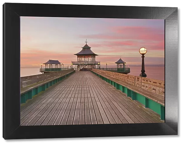 A dusk view of Clevedon Pier, in Clevedon, on the Bristol Channel coast of Somerset
