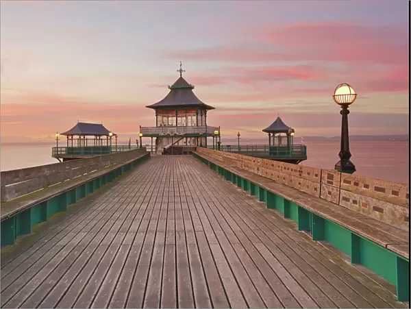 A dusk view of Clevedon Pier, in Clevedon, on the Bristol Channel coast of Somerset
